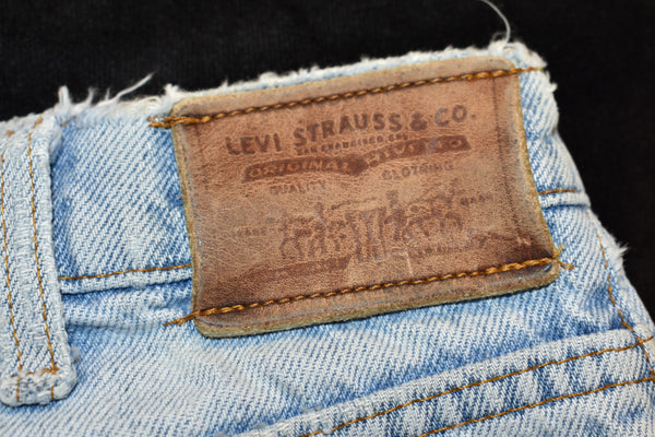 Vintage 90s Distressed Levis Leather Tab Jeans Size 29" x 30"